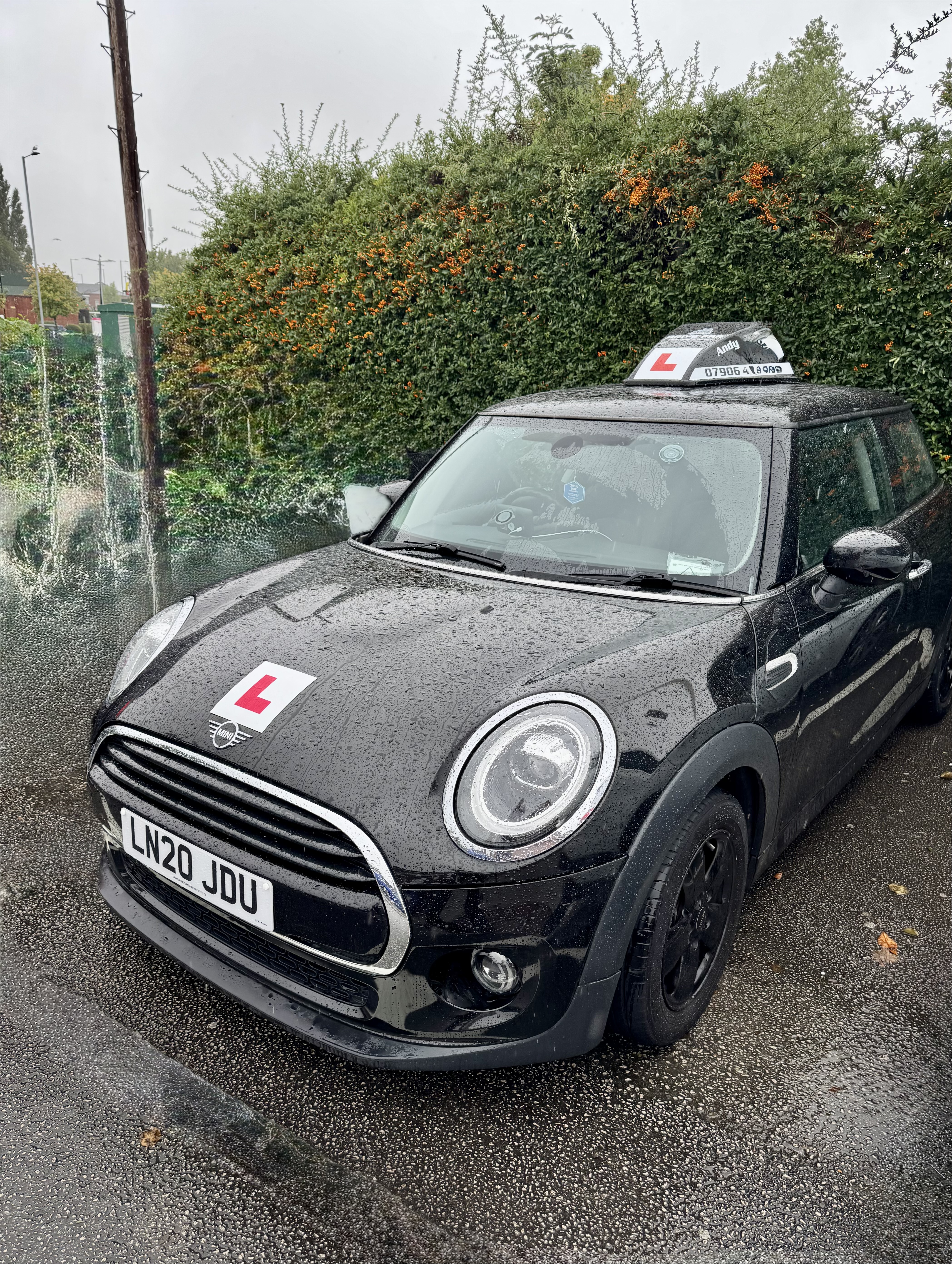 Doodles Driving Services Mini in the rain