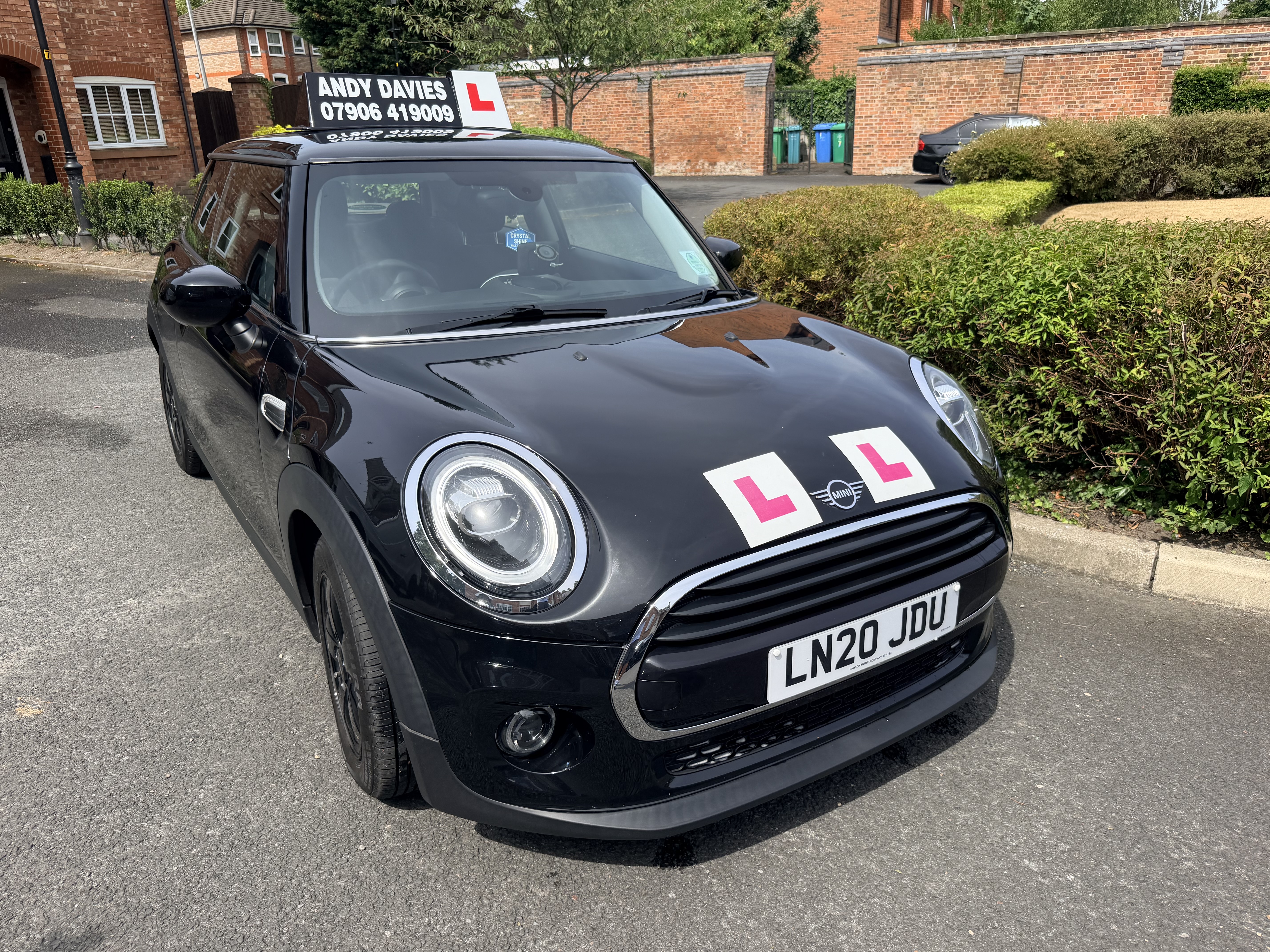 Black Mini driving school car used by Doodles Driving Services